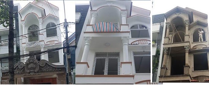 Ngôi nhà được sơn màu trắng điểm kẻ nâu ấn tượng